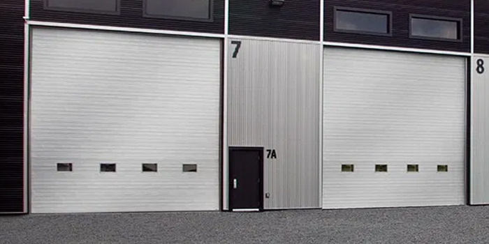 fix bent garage door in Aurora